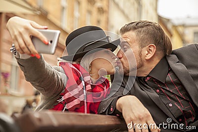 Couple in love takes a selfie with smartphone Stock Photo