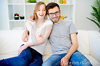 Couple in love watching TV Stock Photo