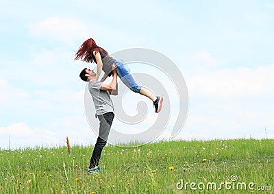 Couple of lovers on meadow Stock Photo