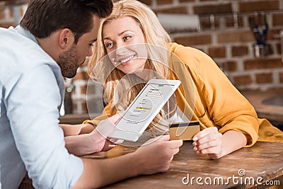 young happy couple making e-shopping with tablet Editorial Stock Photo