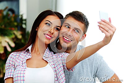 Couple making selfie photo with smarphone Stock Photo