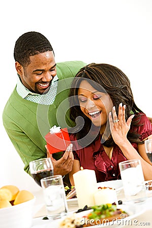 https://thumbs.dreamstime.com/x/couple-man-surprises-woman-present-dinner-extensive-series-young-african-american-having-romantic-48547500.jpg