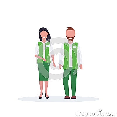 Couple man woman supermarket employees standing together salesman and saleswoman in green uniform happy male female Vector Illustration