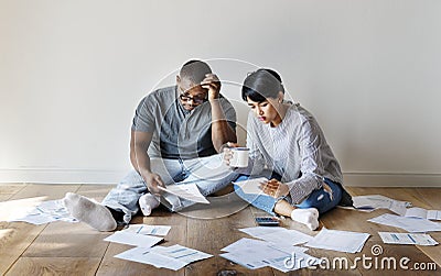 Couple managing the debt together Stock Photo