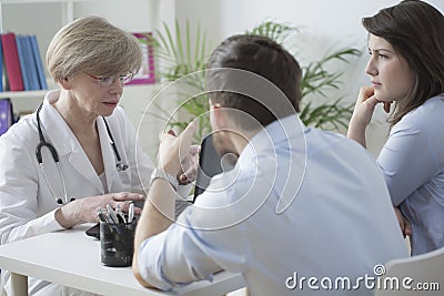 Couple and medical consultation Stock Photo