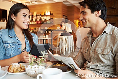 Couple Meeting In Busy Cafe Restaurant Stock Photo