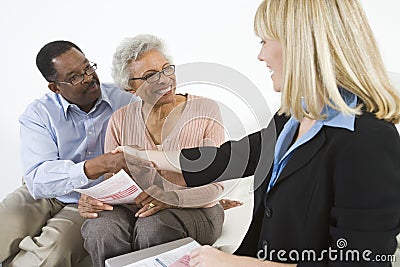 Couple Meeting Financial Advisor Stock Photo