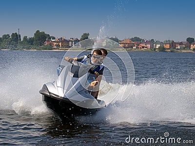 Couple men on jet ski Stock Photo