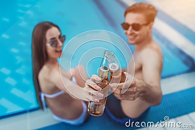 Couple near swimming pool Stock Photo