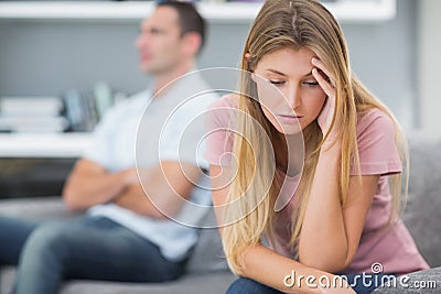 Couple not talking after a fight on the sofa Stock Photo