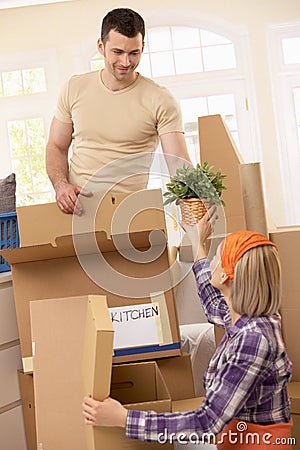 Couple packing to move Stock Photo