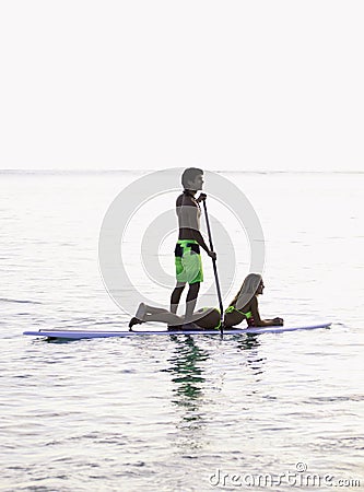 Couple on a paddleboard Stock Photo