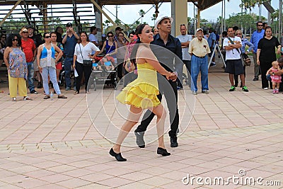 Couple dancing at a festival in Miami Editorial Stock Photo