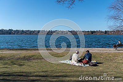 Couple picnic in Greenlake Editorial Stock Photo