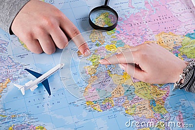 Couple planning vacation trip with map. Top view. Stock Photo