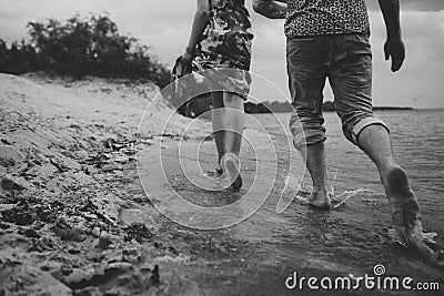 Couple play water splashes love clothes Stock Photo