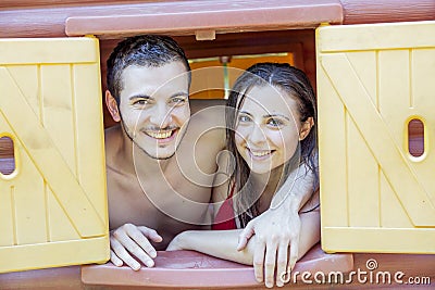 Couple portrait of lovers in swimwear looking out Stock Photo