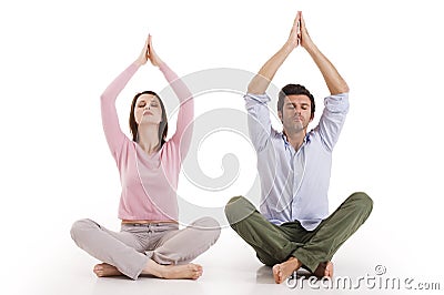 Couple practicing yoga Stock Photo