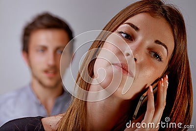 Couple problems concept, is she cheating on him Stock Photo