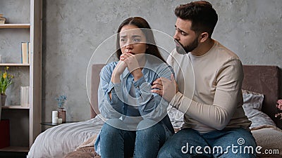 Couple quarrel family problem breakup misunderstanding conflict divorce Caucasian man husband guy calming crying sad Stock Photo