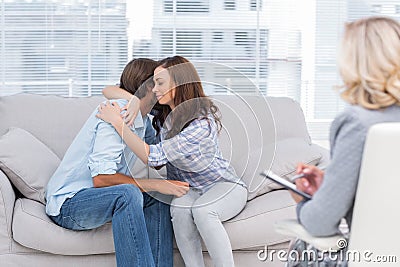 Couple reaching break through in therapy session Stock Photo
