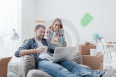 Couple relaxing during home renovation Stock Photo
