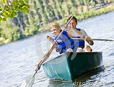 Couple rowing boat Stock Photo