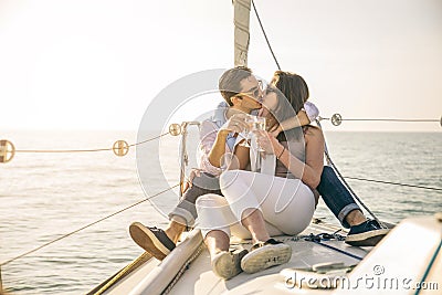 Couple sailing on boat Stock Photo