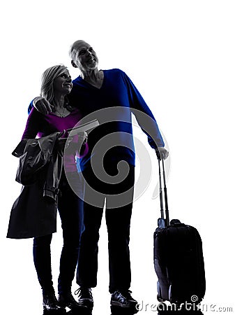 Couple senior travelers traveling silhouette Stock Photo