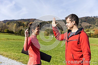 Couple set ready for outdoor exercises Stock Photo