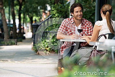 Couple At Sidewalk Cafe Stock Photo