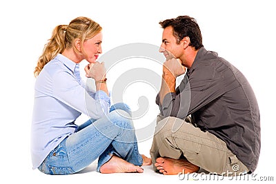Couple sitting face to face Stock Photo