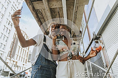 Couple snacking on fruit in the summer Stock Photo