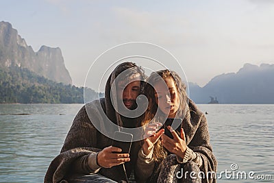 Couple staying connected through social media Stock Photo