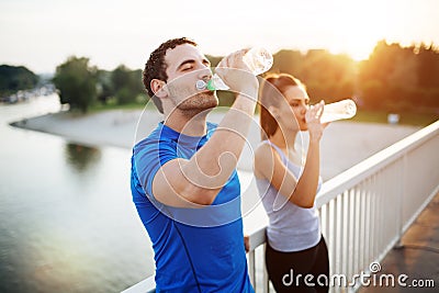 Couple staying hydrated Stock Photo