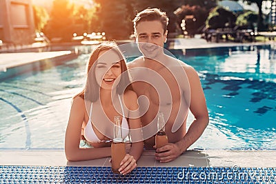Couple in swimming pool Stock Photo