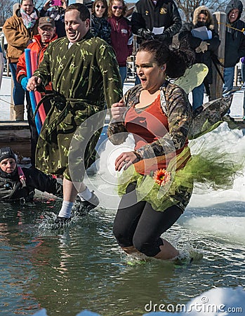 A Couple Take the Polar Plunge Editorial Stock Photo