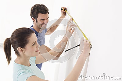 Couple takes measures Stock Photo