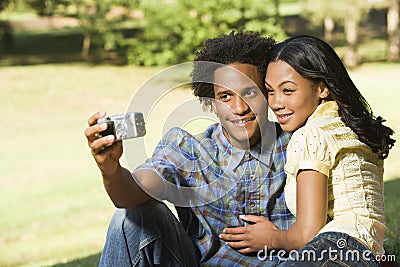 Couple taking pictures. Stock Photo