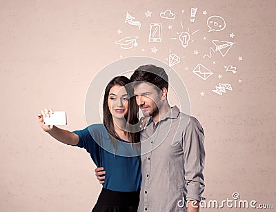 Couple taking selfie with thoughts illustrated Stock Photo