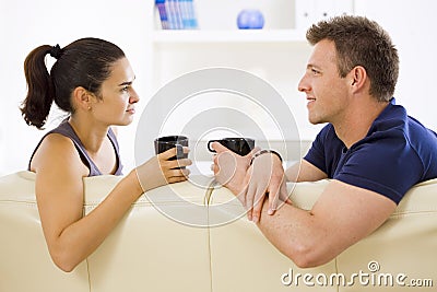 Couple talking at home Stock Photo