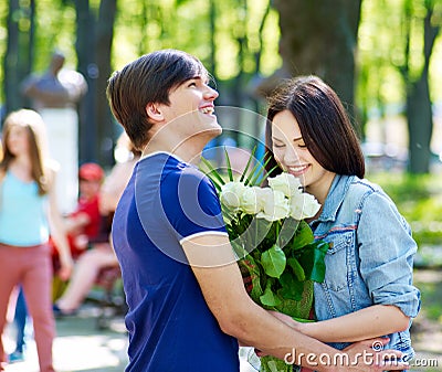 Couple of teenager on date outdoor. Stock Photo