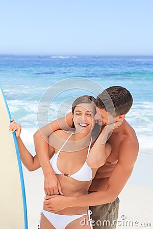 Couple with their surfboard Stock Photo
