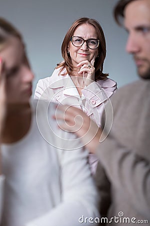 Couple therapist supporting young marriage Stock Photo