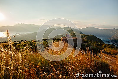 Couple travel mountains and sea view Editorial Stock Photo