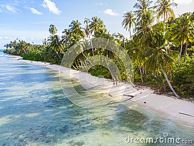 Couple on tropical beach at Tailana Banyak Islands Sumatra tropical archipelago Indonesia, Aceh, coral reef white sand beach Stock Photo