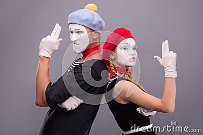 Couple of two funny mimes isolated on background Stock Photo
