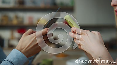 Couple typing smartphones ignoring each other at home close up. Unhappy family. Stock Photo