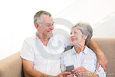 Couple using mobile phone Stock Photo