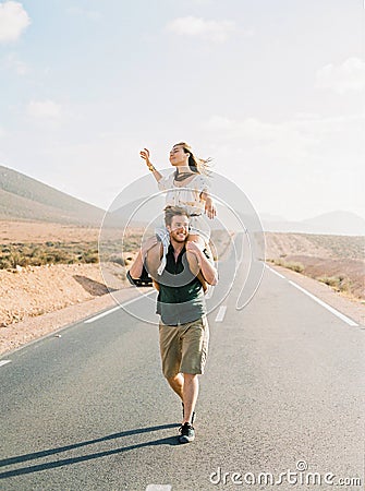 Couple walking on the road in Morocco. Stock Photo